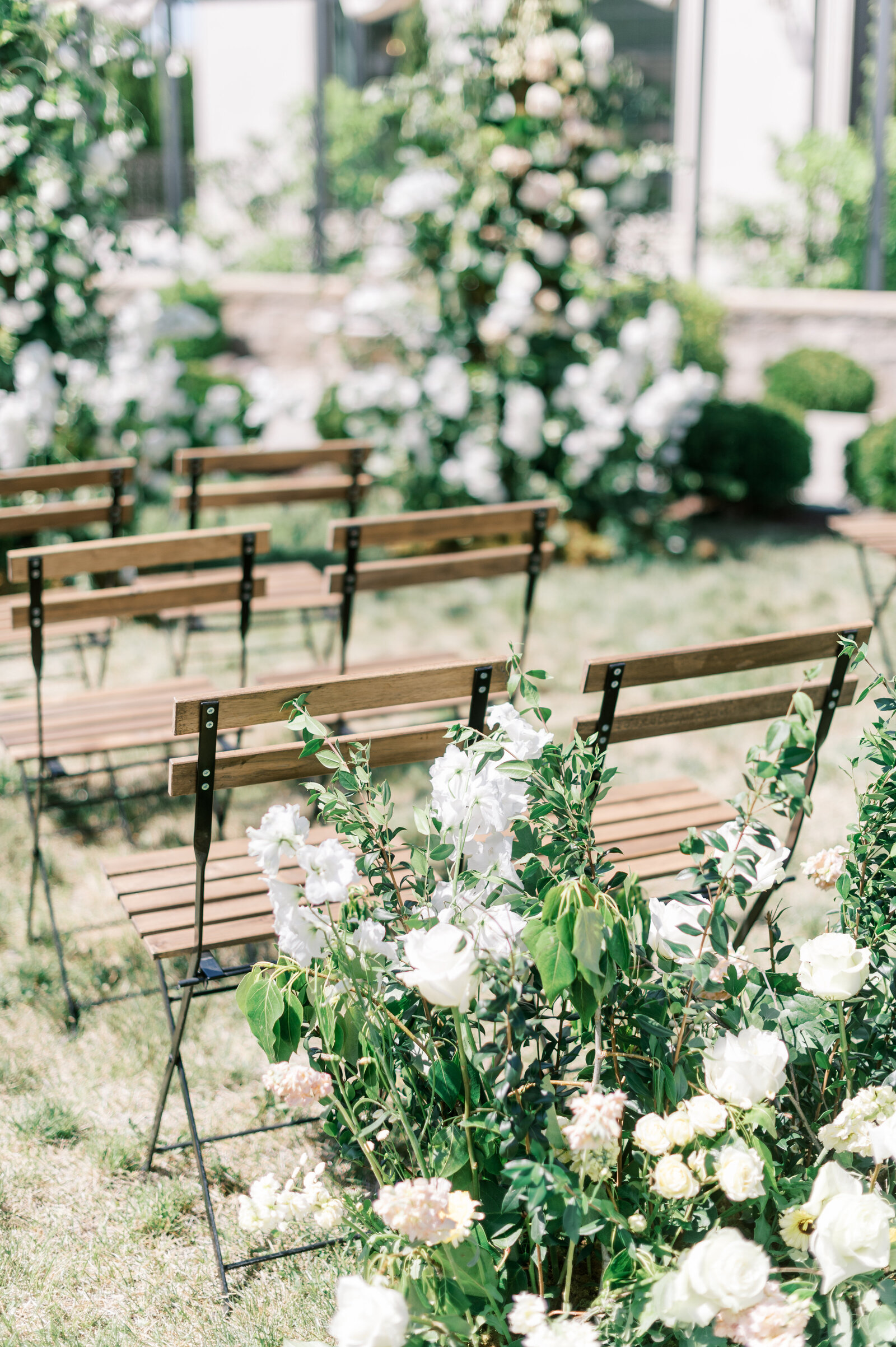 Chateau Des Fleurs Wedding ceremony setup with wooden chairs in Boise Idaho