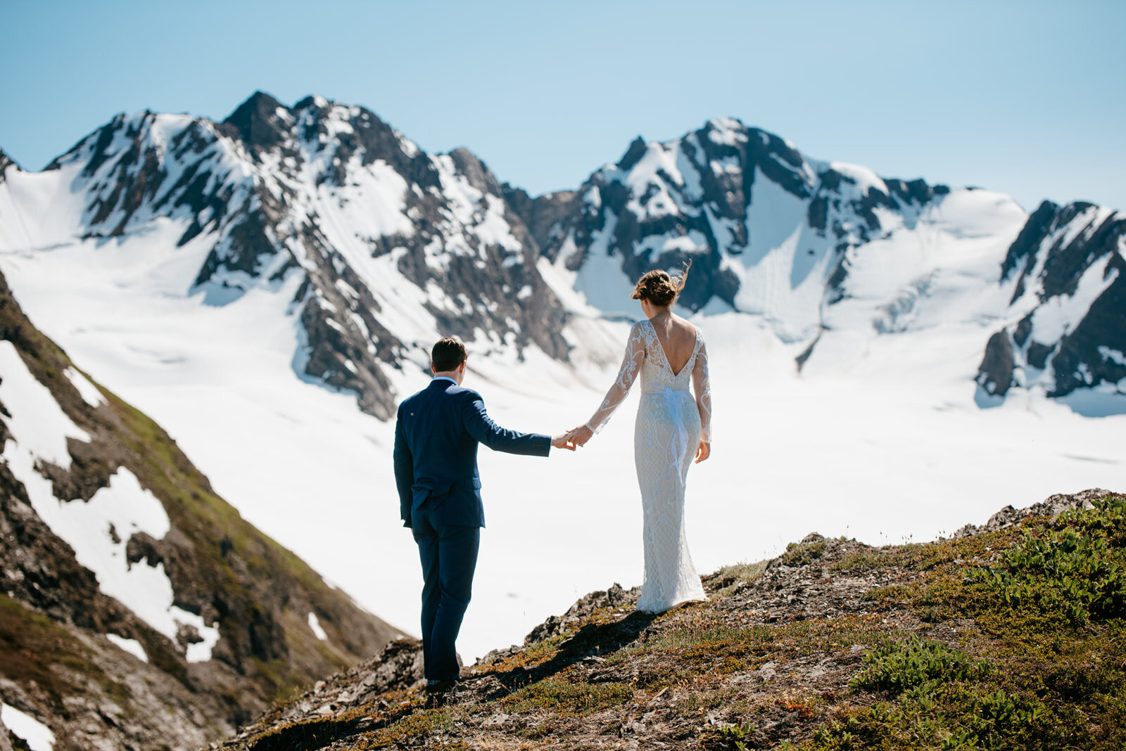 couple standing on knik glacier