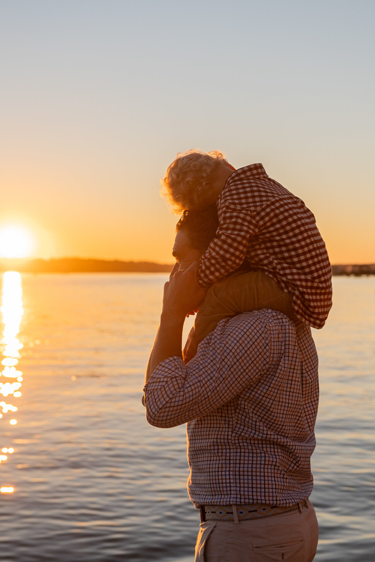 father and son at sunset