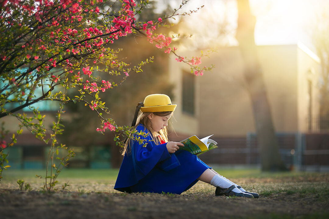 backlight-sunlight-natural-light-madeline-book-reading-longmont-colorado-historic-district-vintage-vibrant-colorful-children-clasic