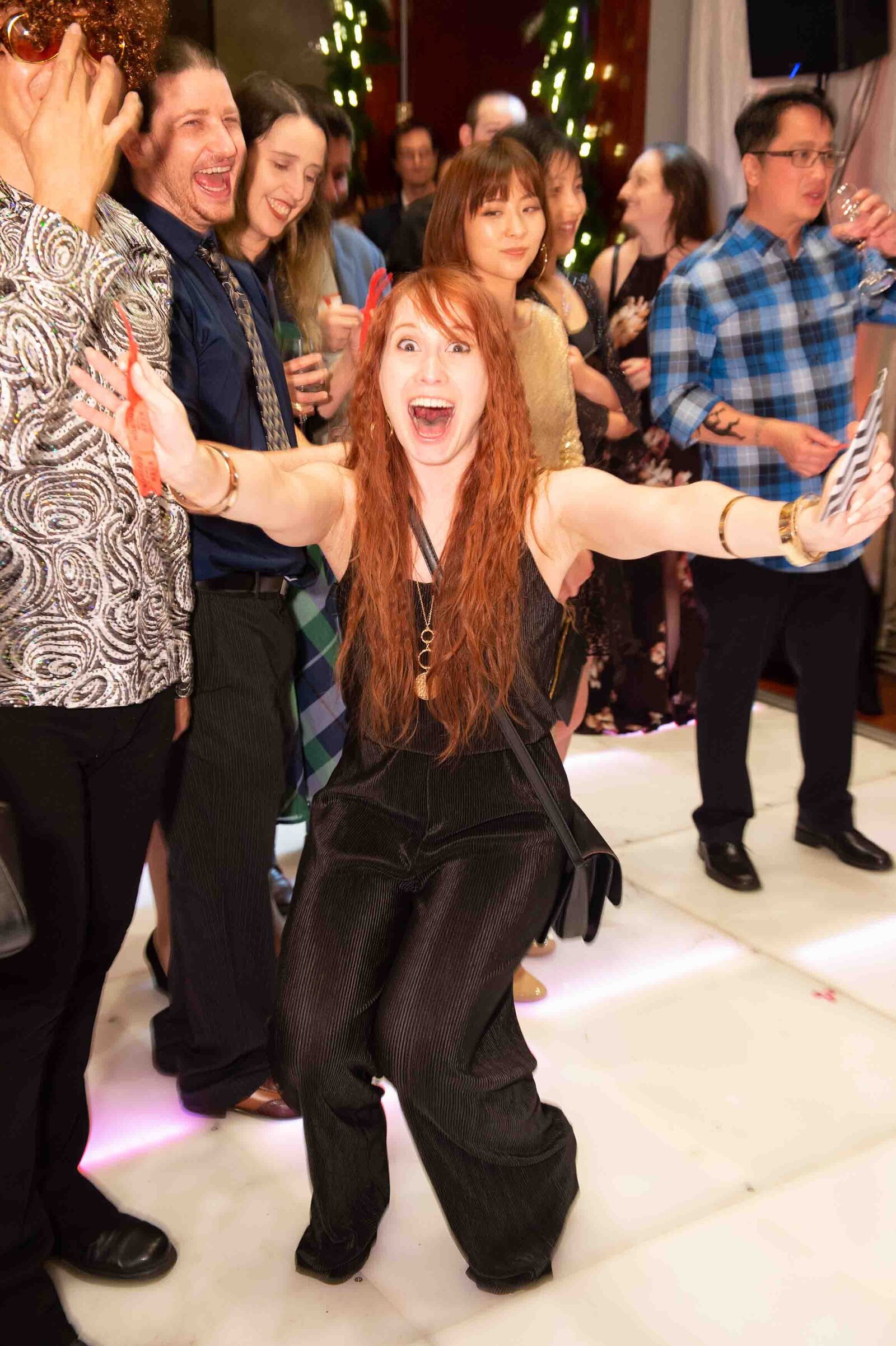 Holiday party, excited woman winning prize.-2018