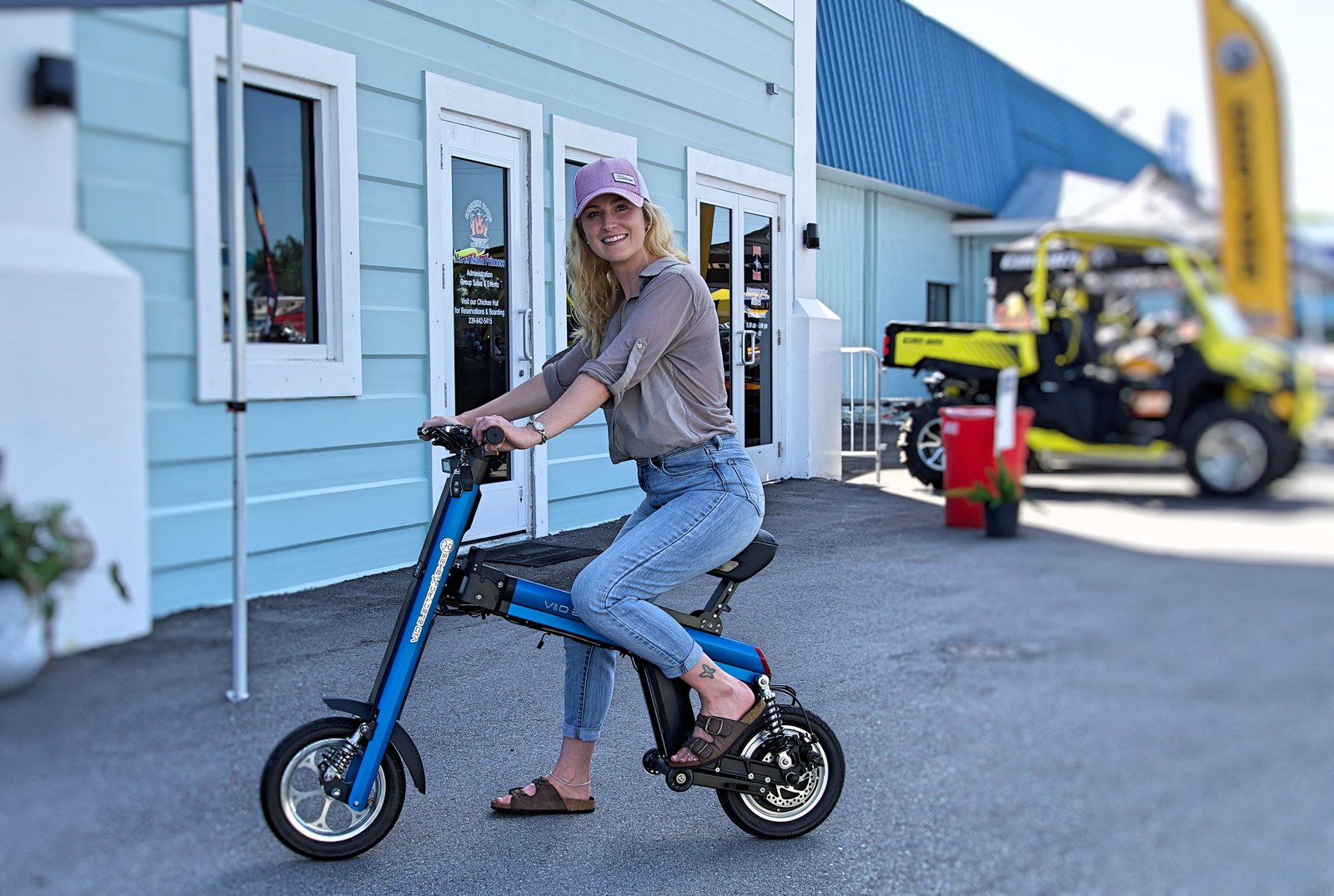 Blue Go-Bike M2 with lady wearing pink hat