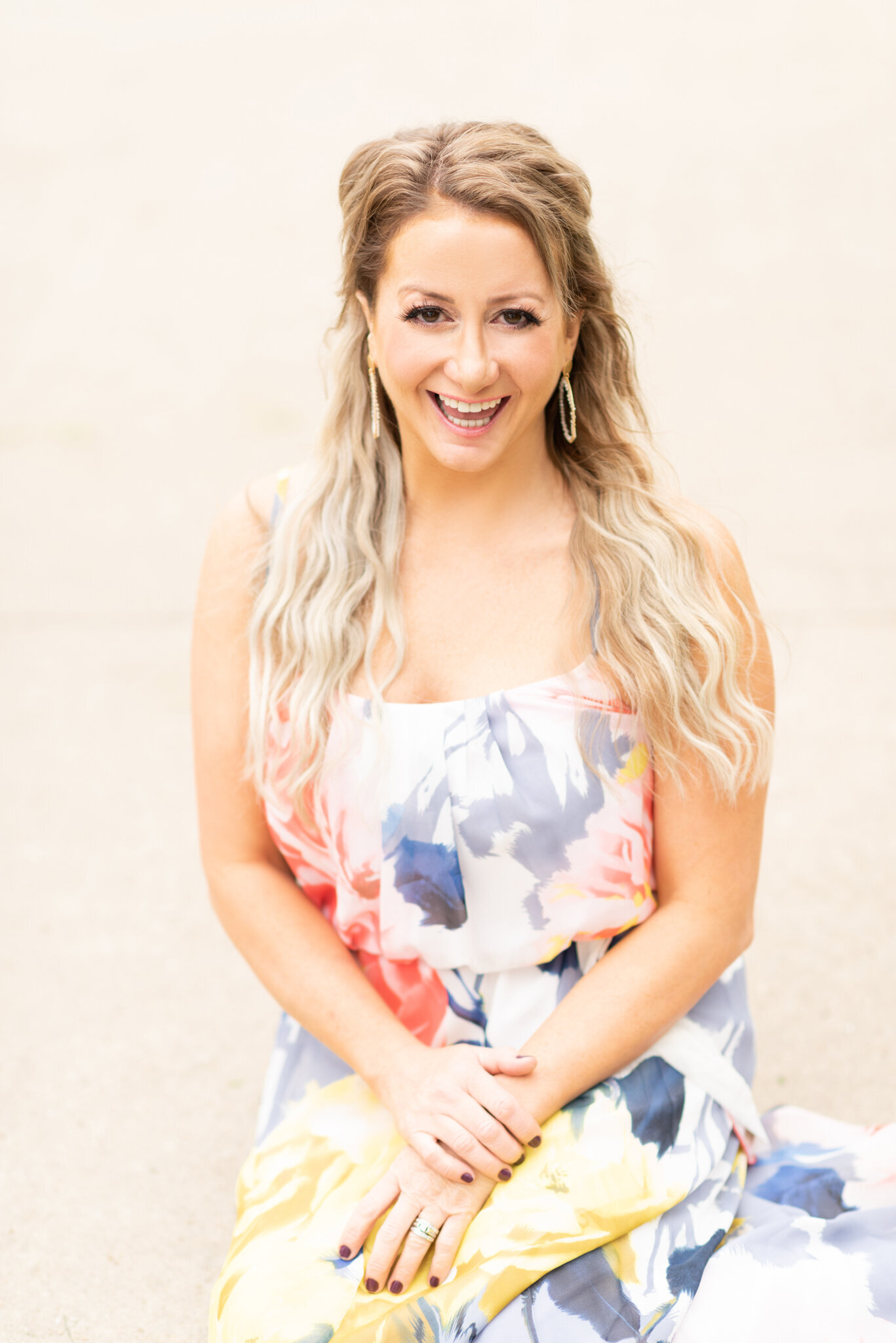 Smiling-woman-colorful-dress-personal-brand-headshot-photography