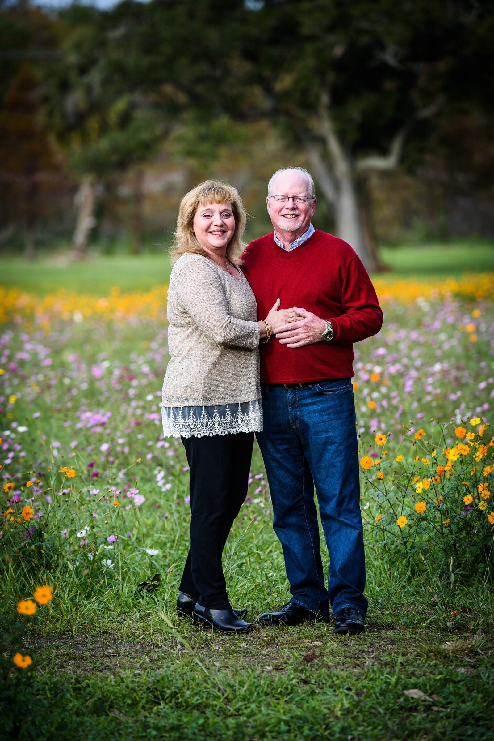Couple standing among flowers in City Park
