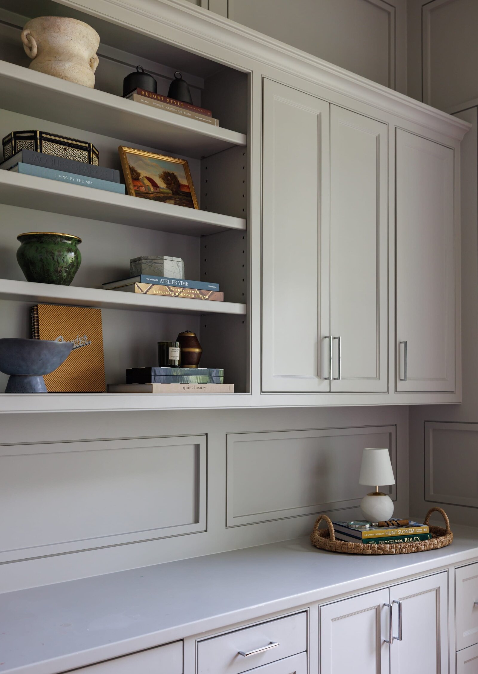 vision and hammer styled shelves with light gray painted cabinets