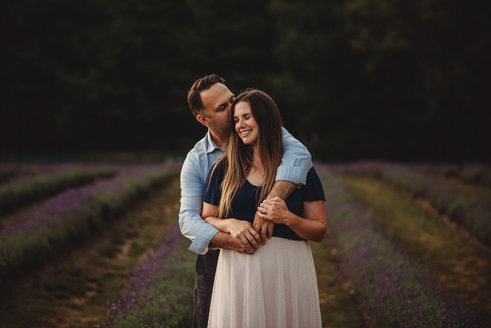 Couple embracing at Laveanne Lavender