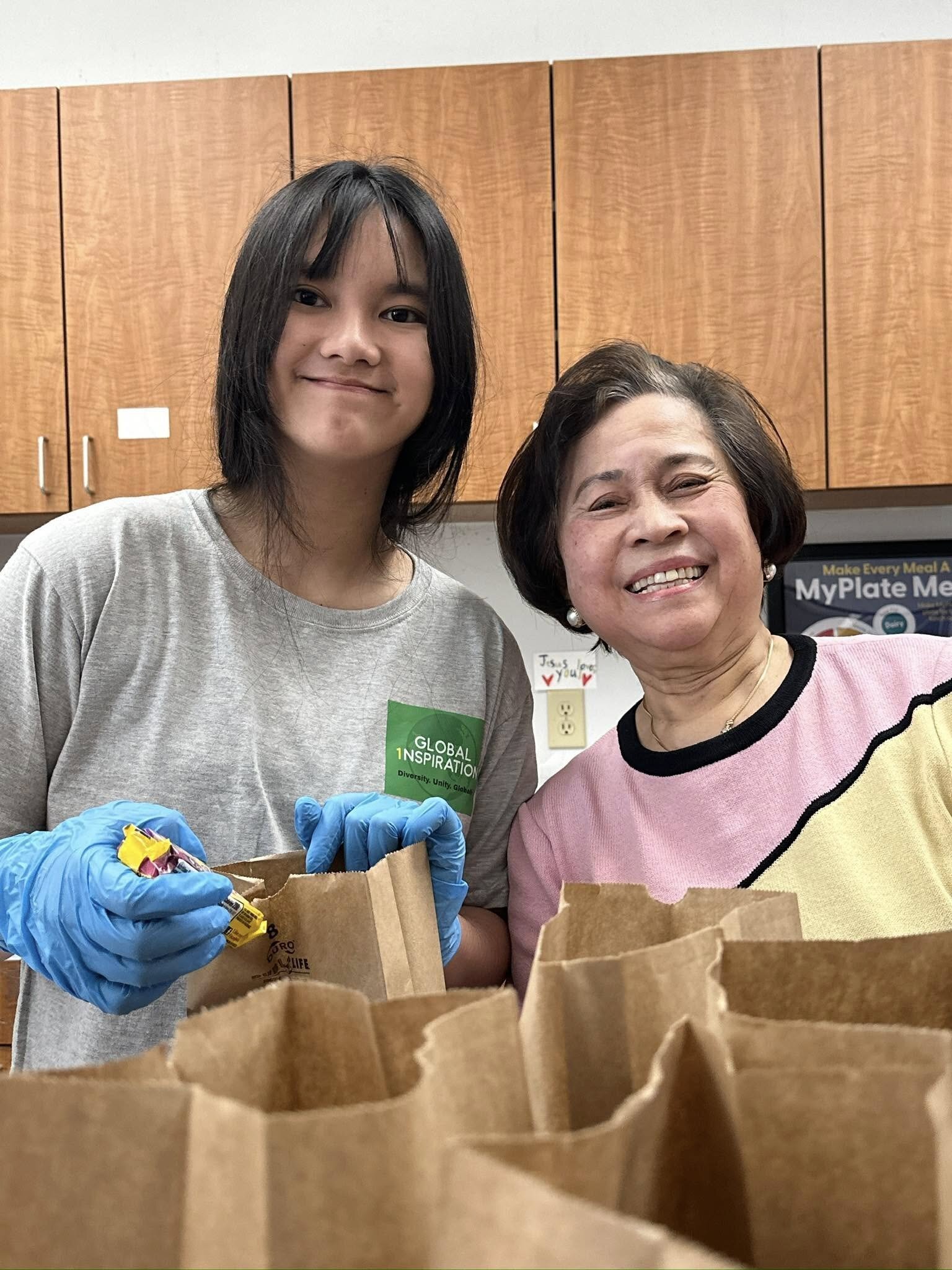Social Services - 2025 -3 - Serving Lunch for Milwaukee Homeless - Youth and Dr. Singson