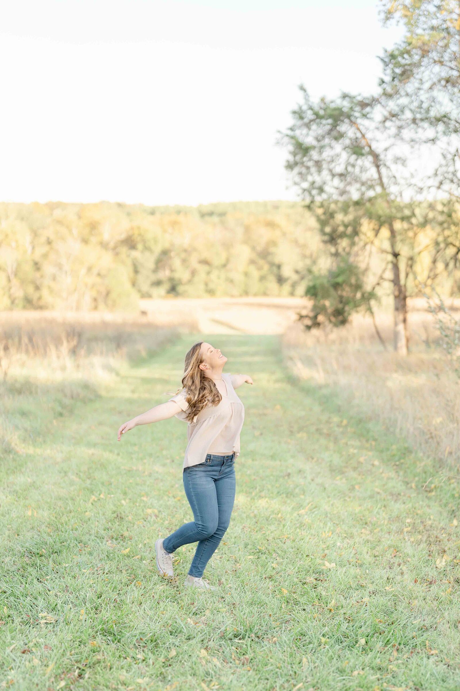 girl soaking in the moment taken by Ashburn, VA senior photographer