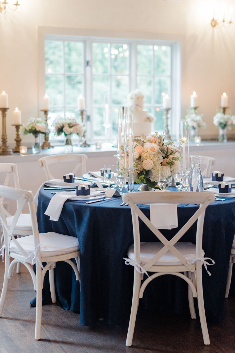 Navy and white reception table setup