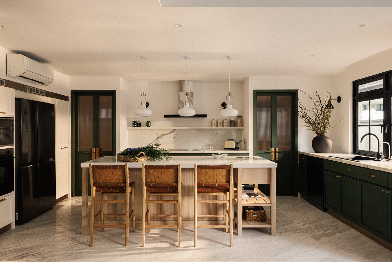 wide view of a kitchen with island and island stools