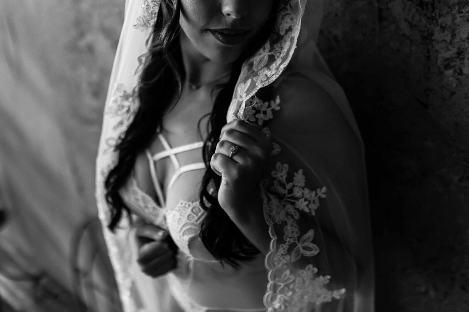 black and white photo of a woman in a lace