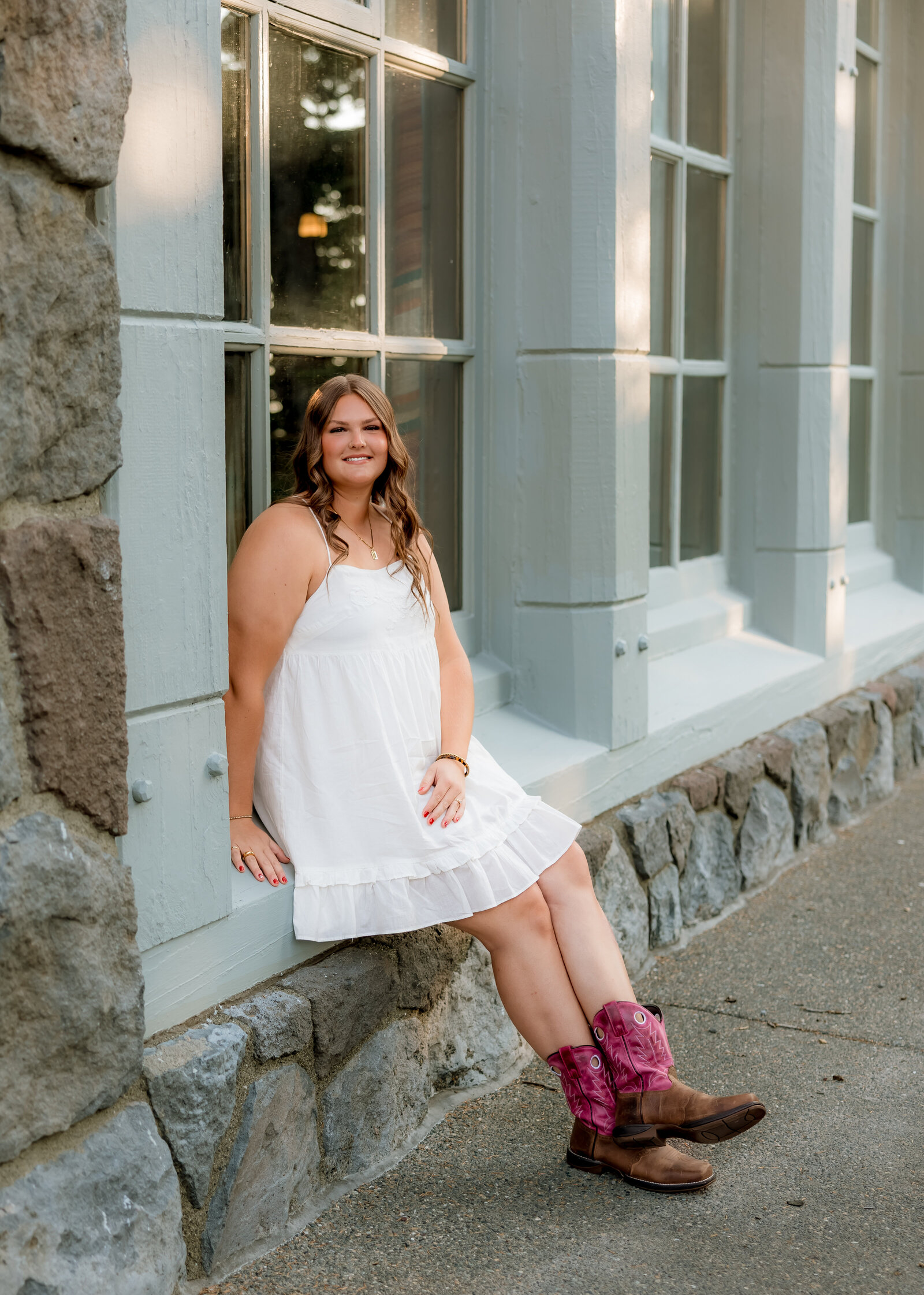 Sandy High School senior doing senior portraits at sunset at Timberline Lodge.