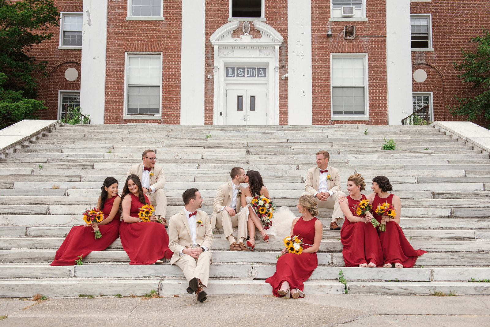 Bridal party at the steps of the Bourne Mansion