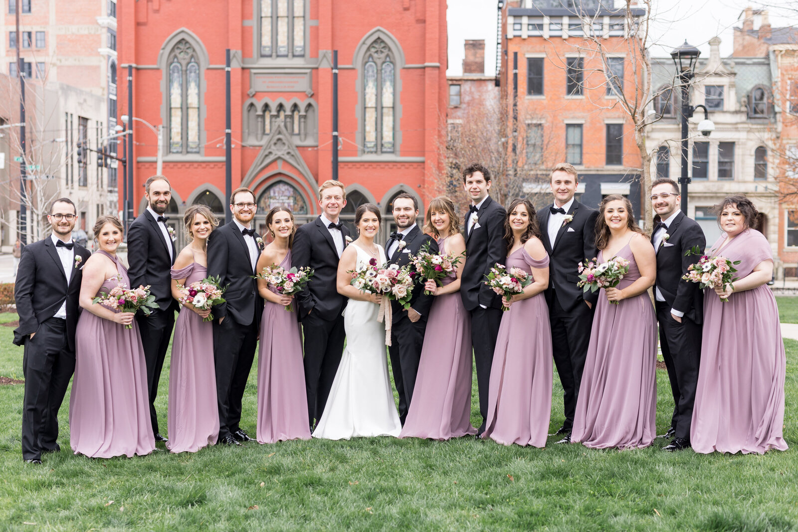 couple with wedding party