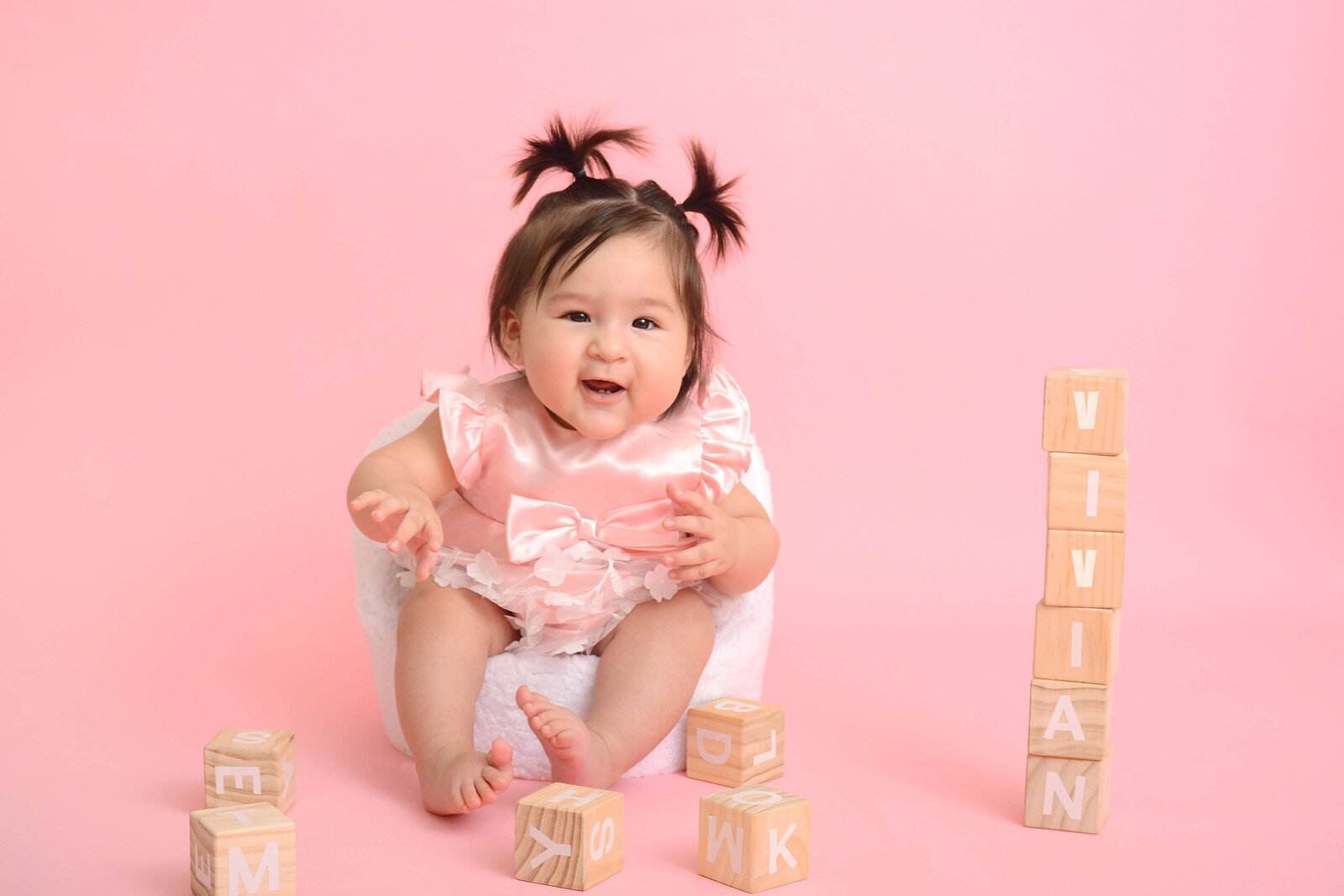 girl smiles at half bday session