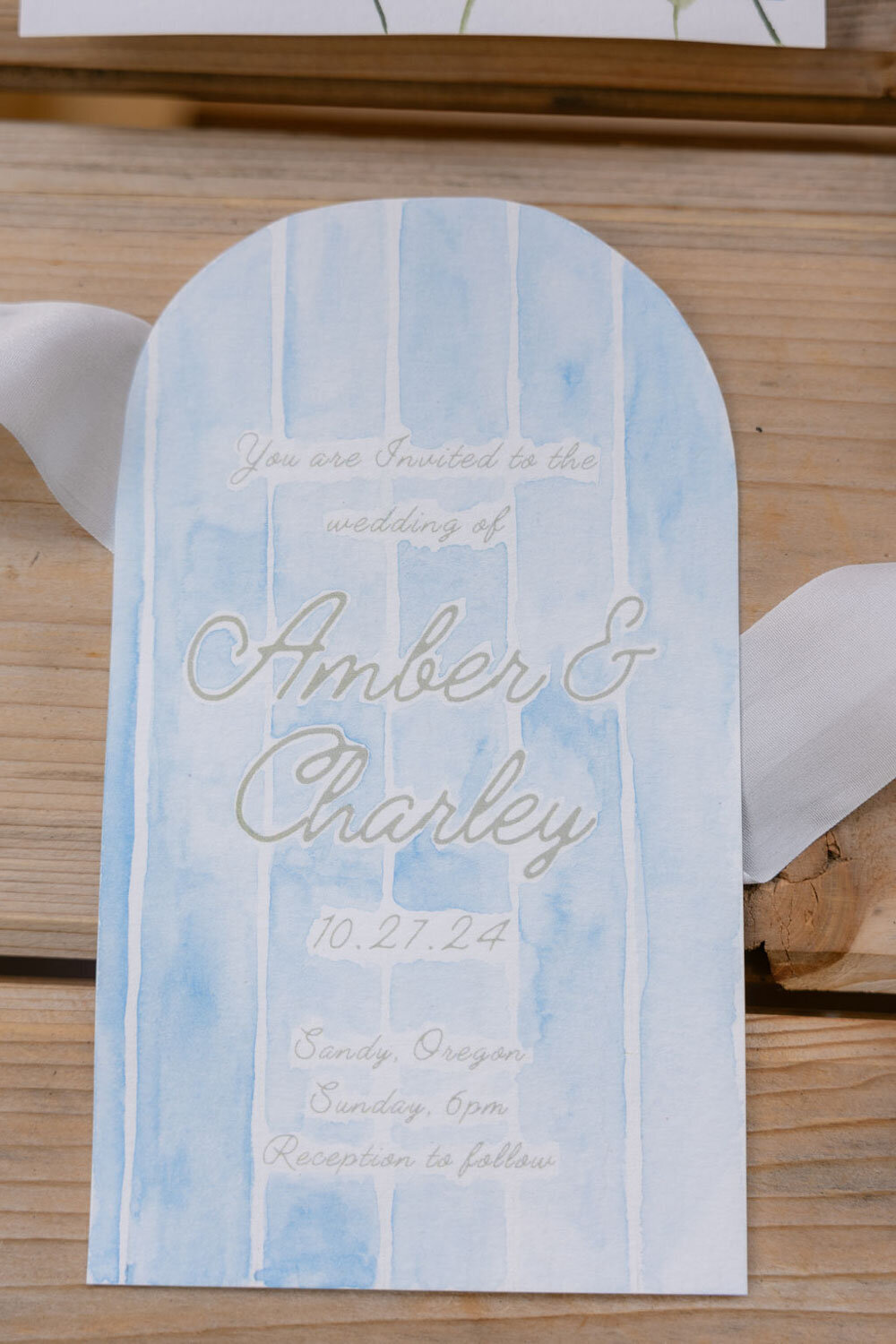 Elegant wedding invitation of Amber and Charlie