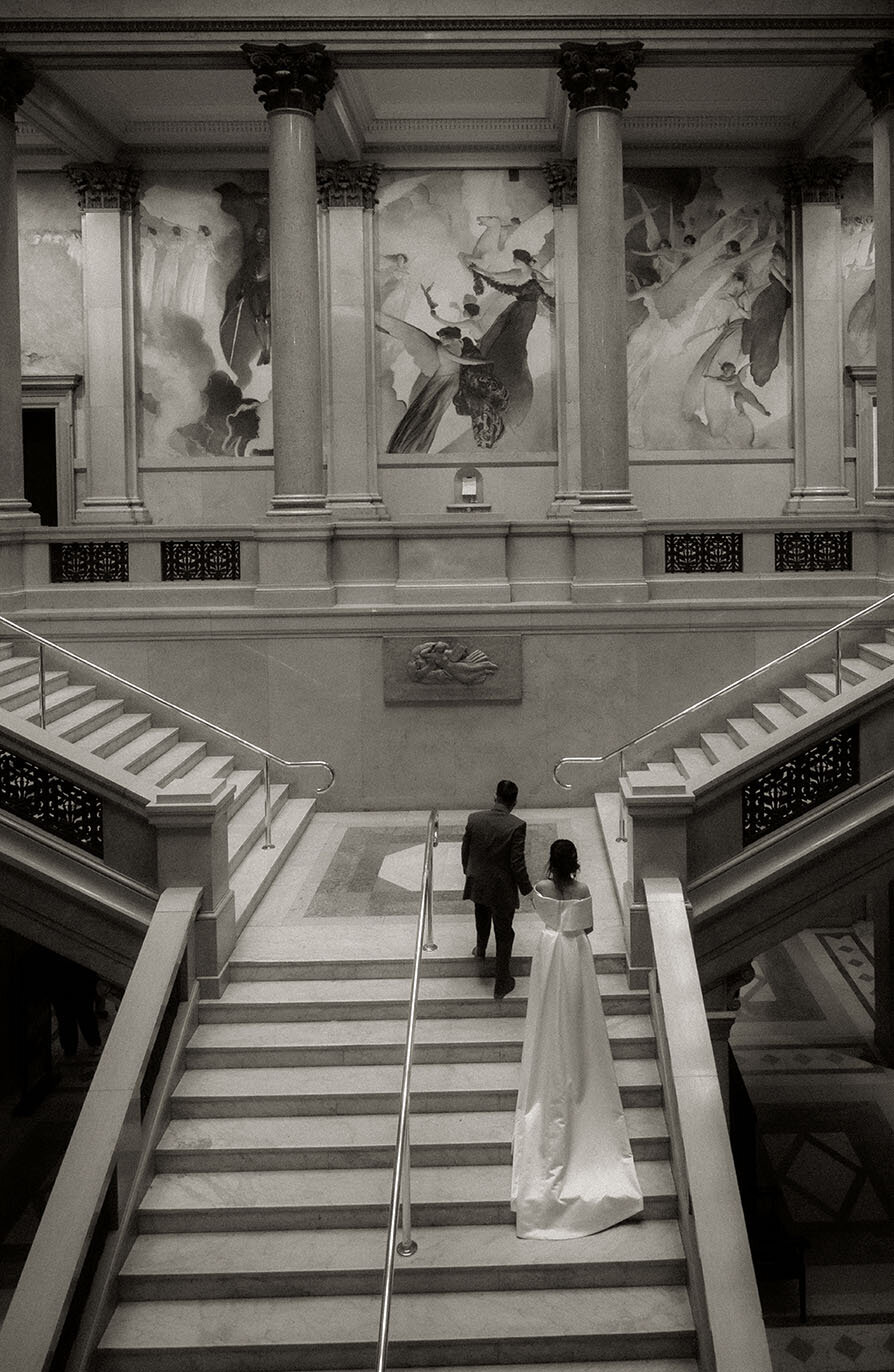 Bride and Groom Going Up the Stairs at Carnegie Museum of Art in Pittsburgh