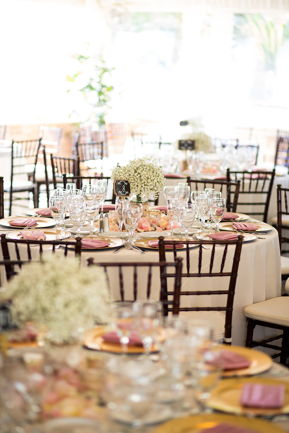gold and pink tables at the reception