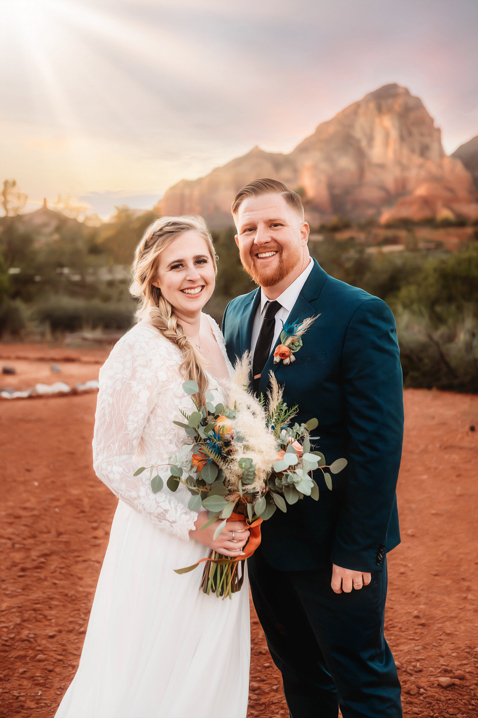 Bride & Groom pose for newlywed portraits after their Micro-Wedding in Sedona Arizona.