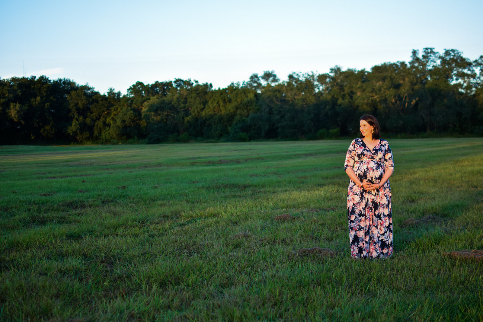 Maternity pregnant girl floral maxi dress field Tucker Ranch Winter Garden Florida