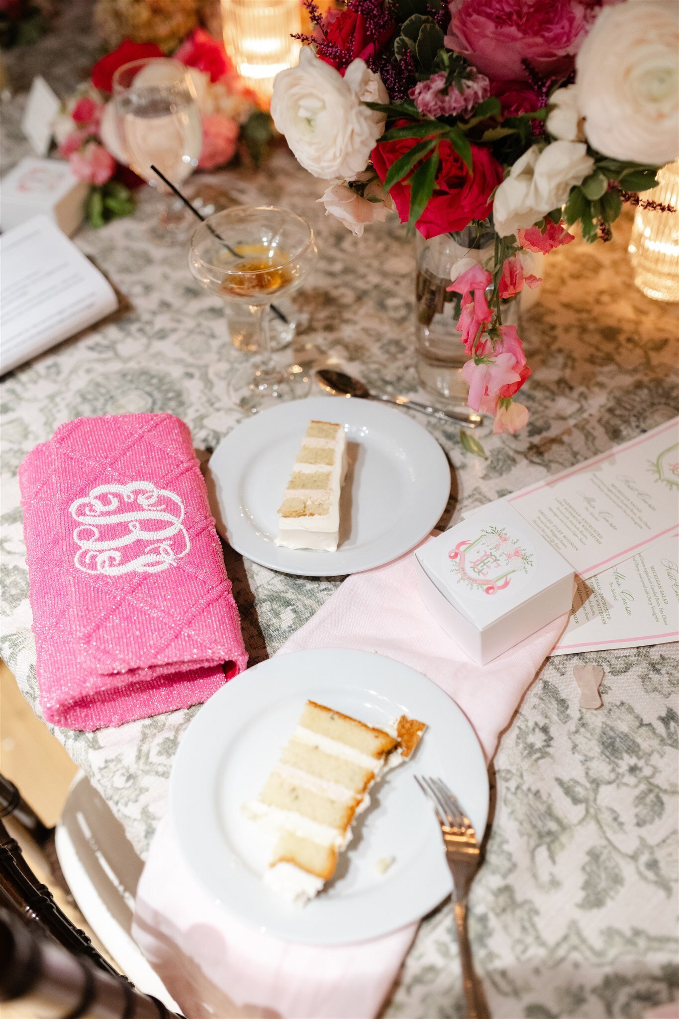 A vogue-esque photo taken with direct flash of wedding reception details strewn onto the table at a reception