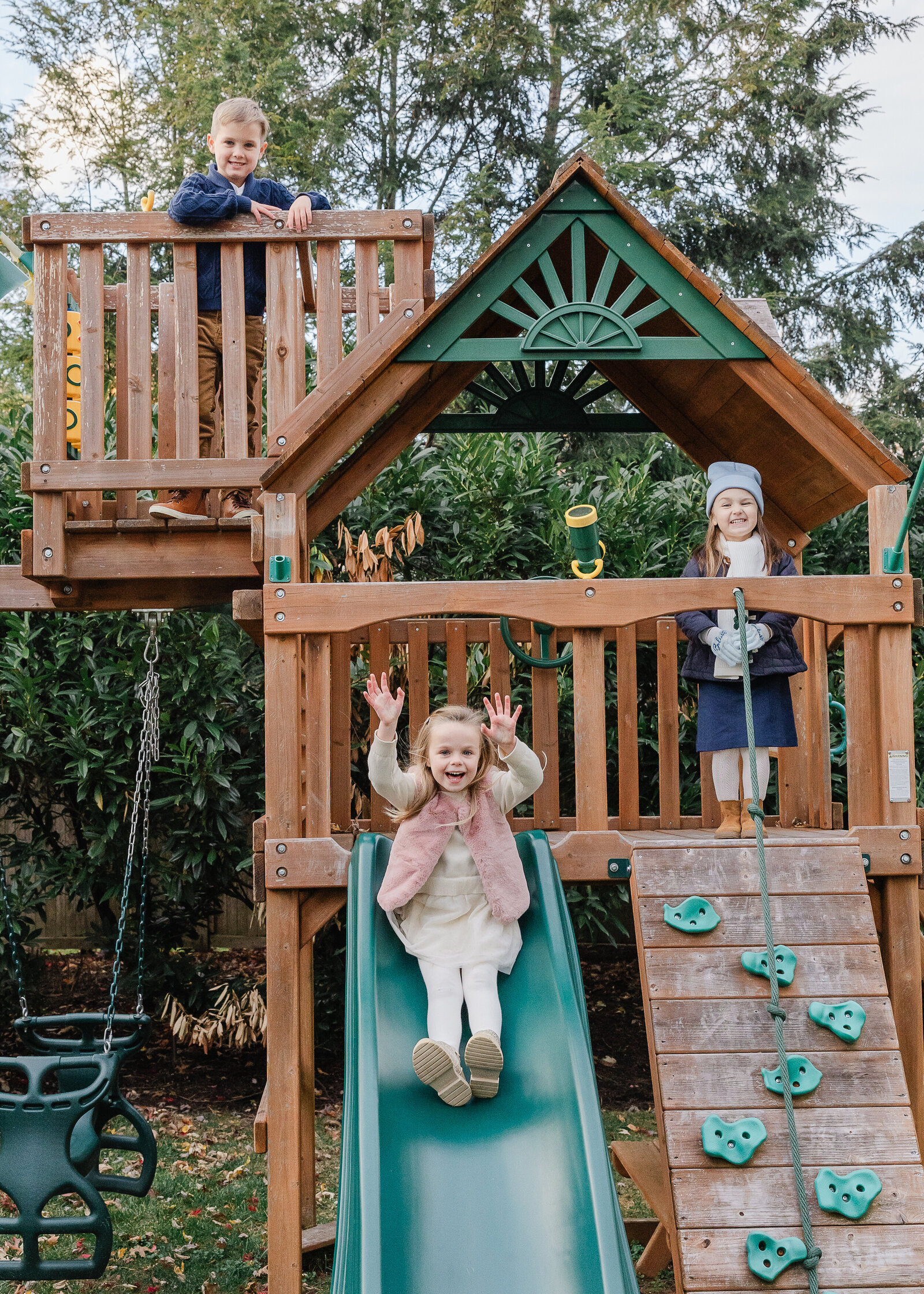 Lifestyle portrait of young kids playing in their backyard