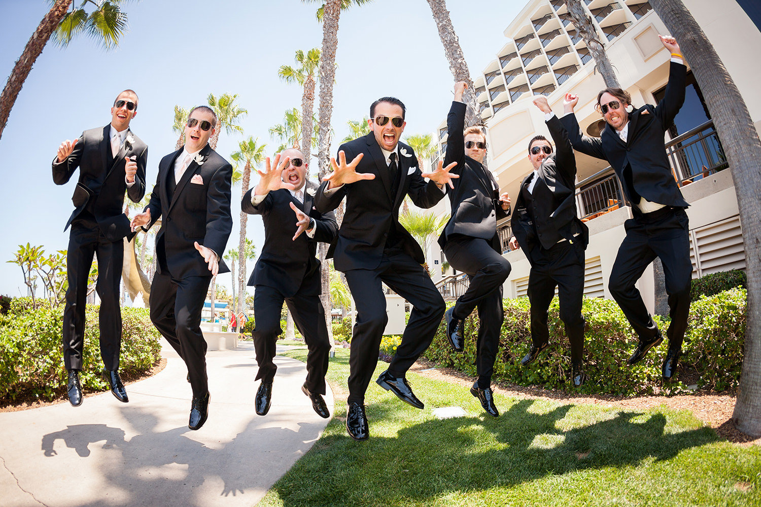 groomsmen jumping in the air