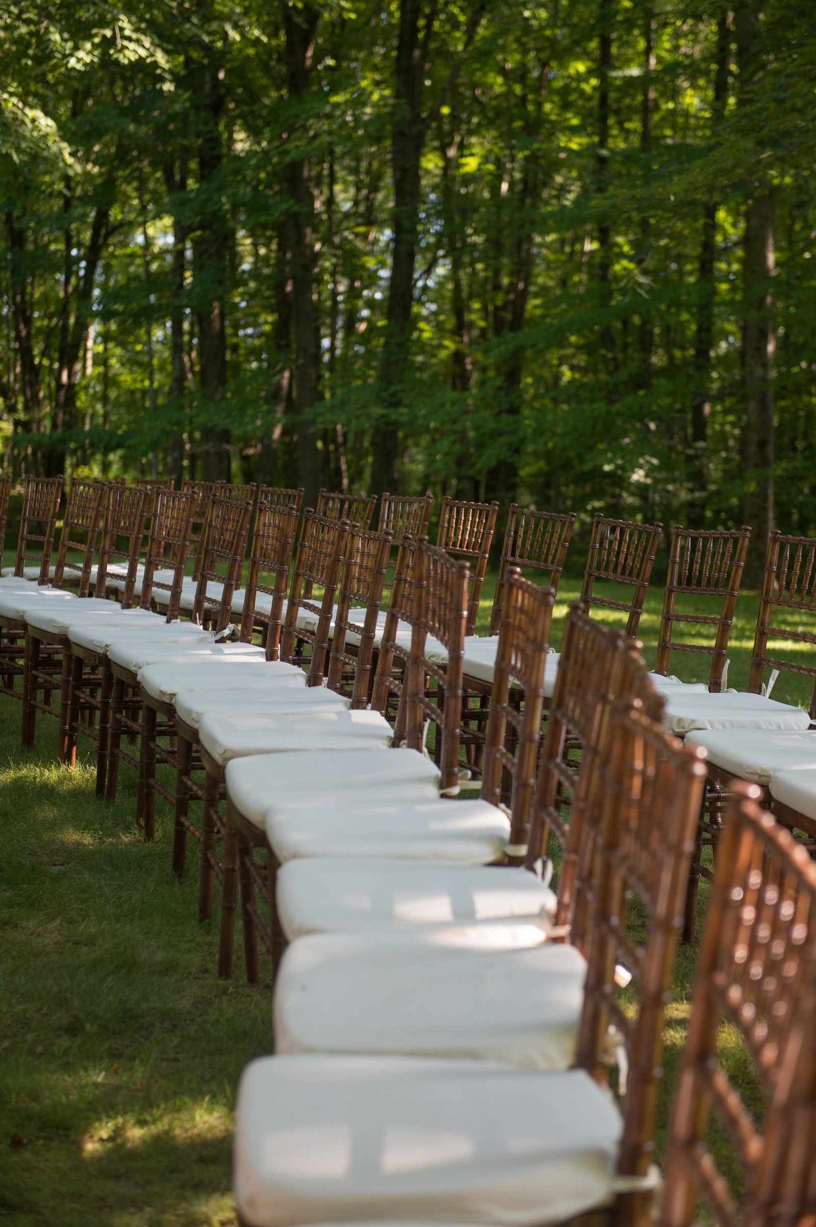 Gorgeous outdoor home wedding ceremony with white chuppah in Washington, CT