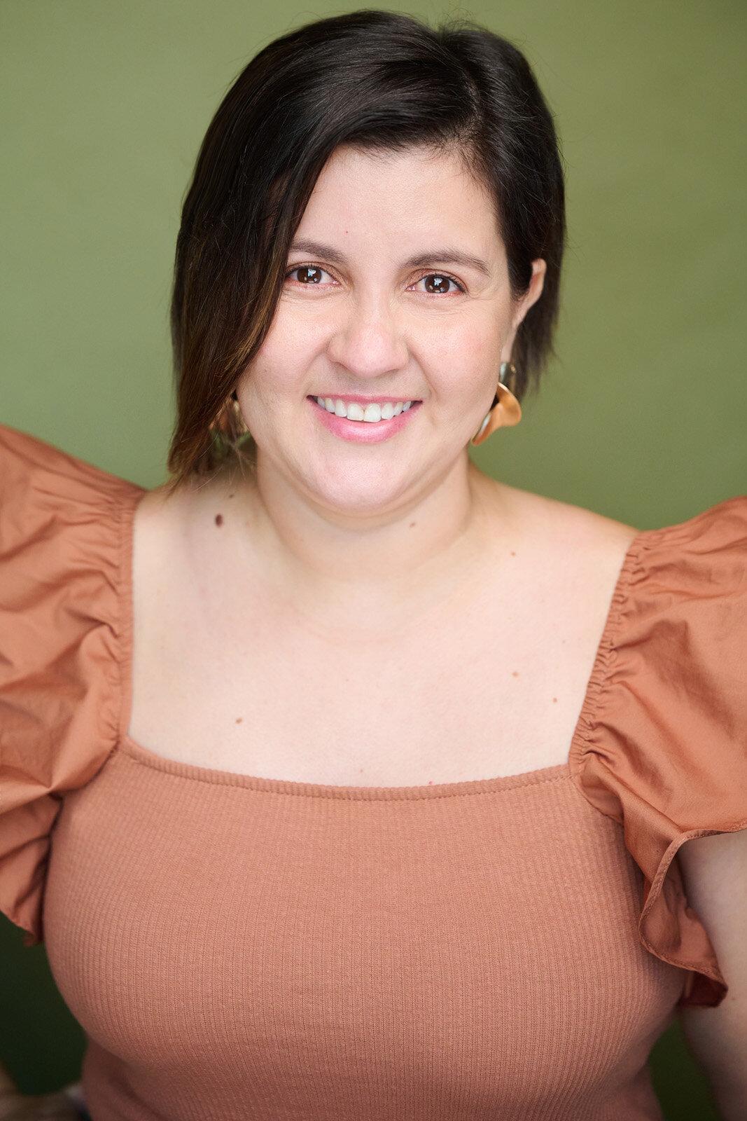 Professional Headshot by Photographer in Minneapolis Studio With Warm Lighting-46