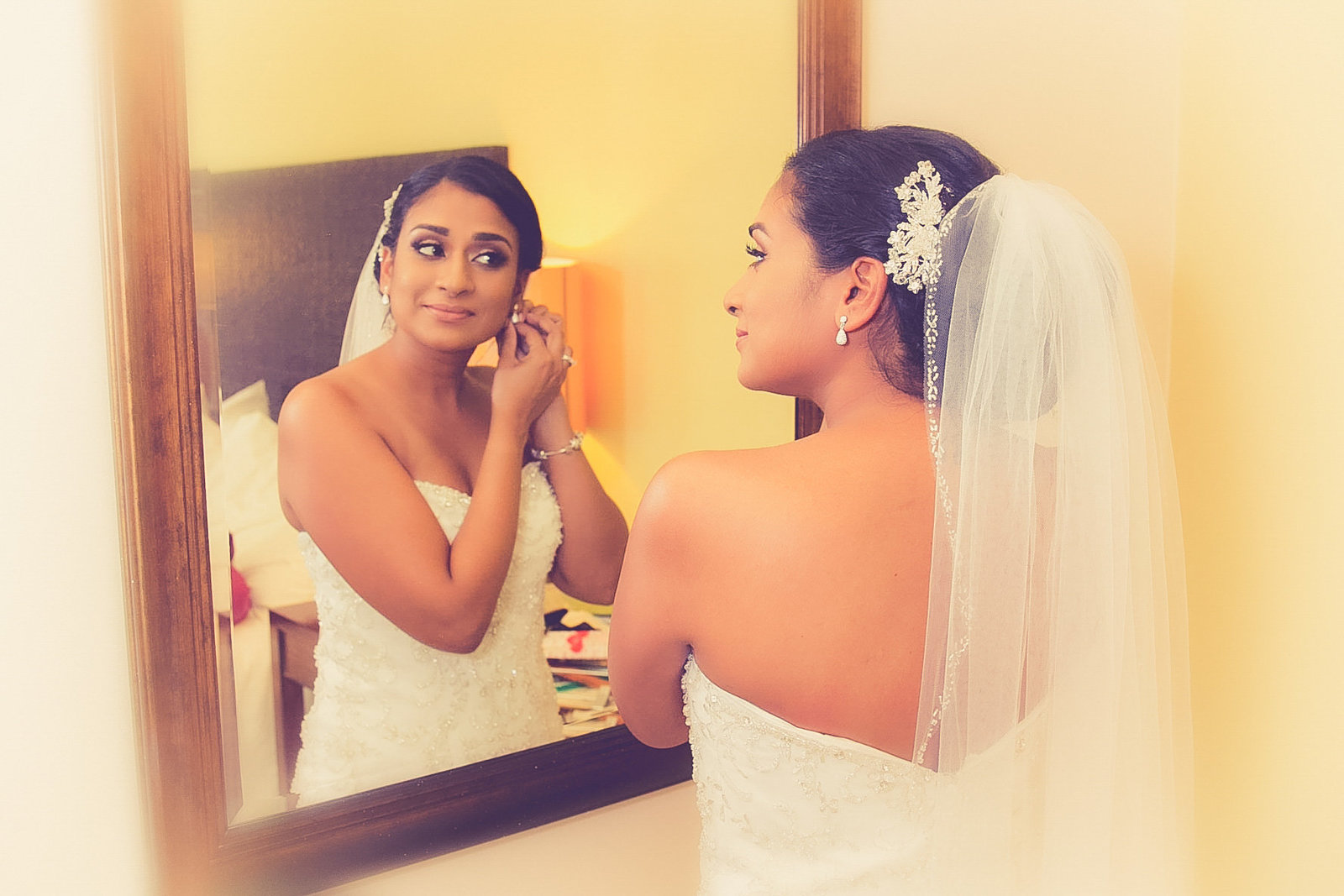 Bride with reflection in mirror. Photo by Ross Photography, Trinidad, W.I..