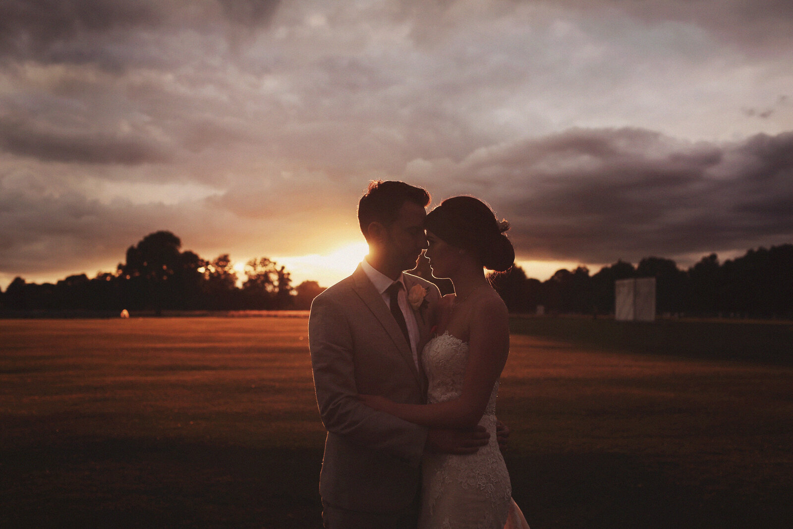 EW-BRIDE-AND-GROOM-AT-SUNSET-0037