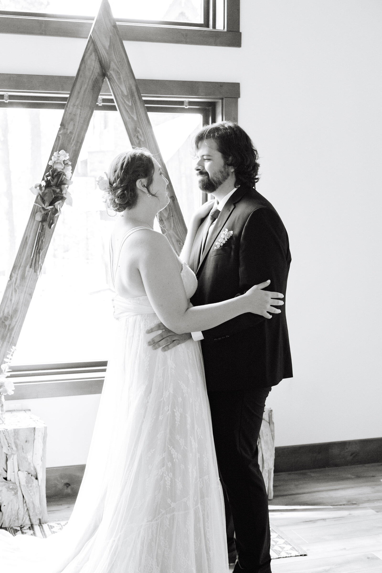 A couple celebrates their intimate elopement at a cabin at Big Bear Lake, California.