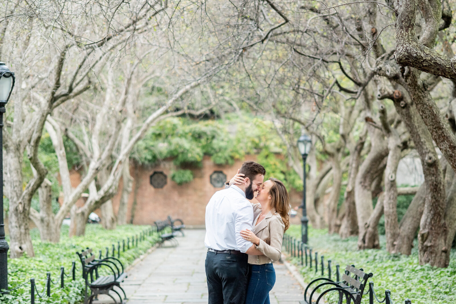 Engaged couple in Central Park engagement photos