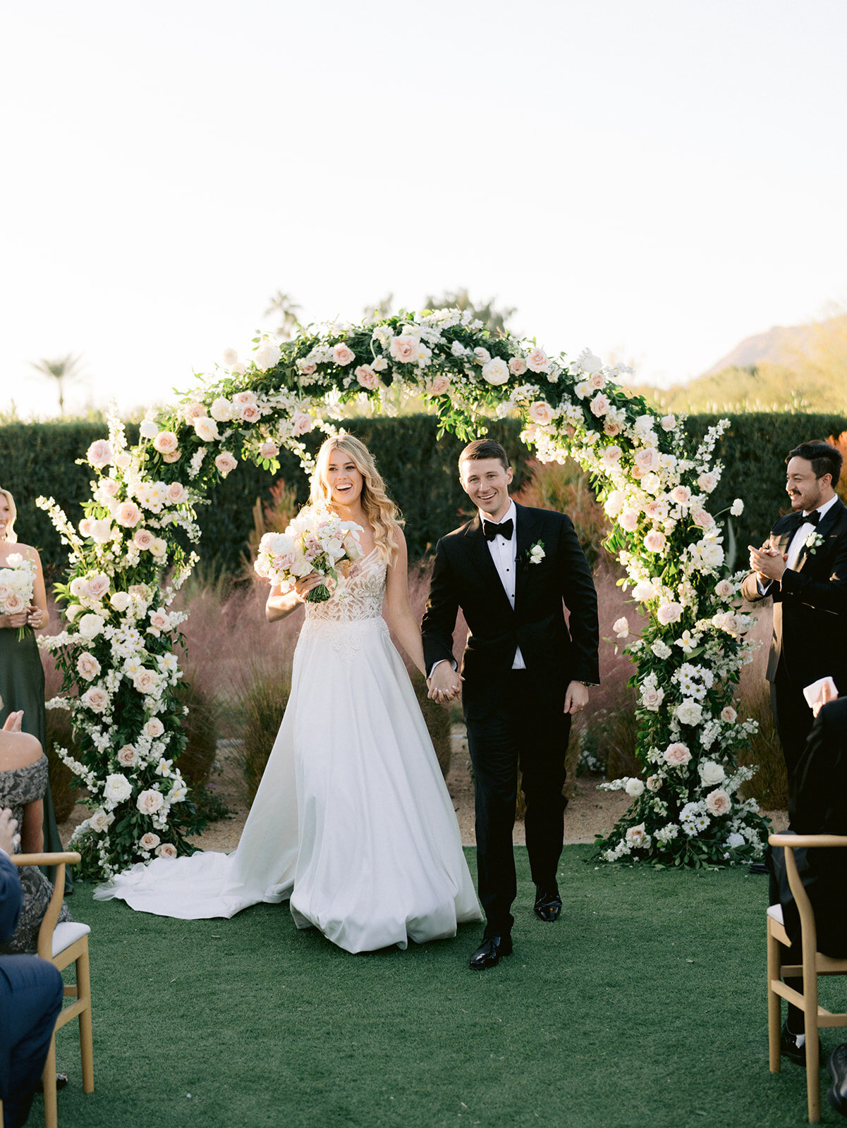 wedding-bouquets-az-white-blush-flowers-ceremony-arch