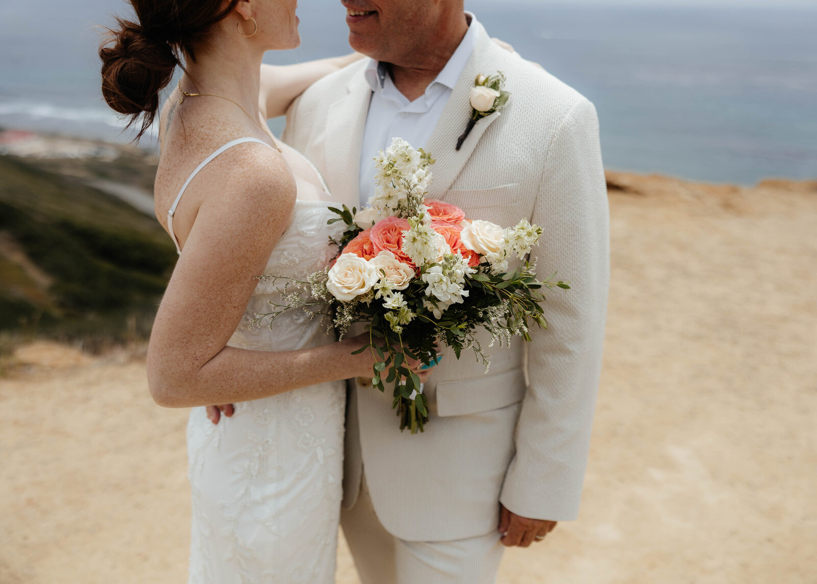 Bride and groom posing and showin