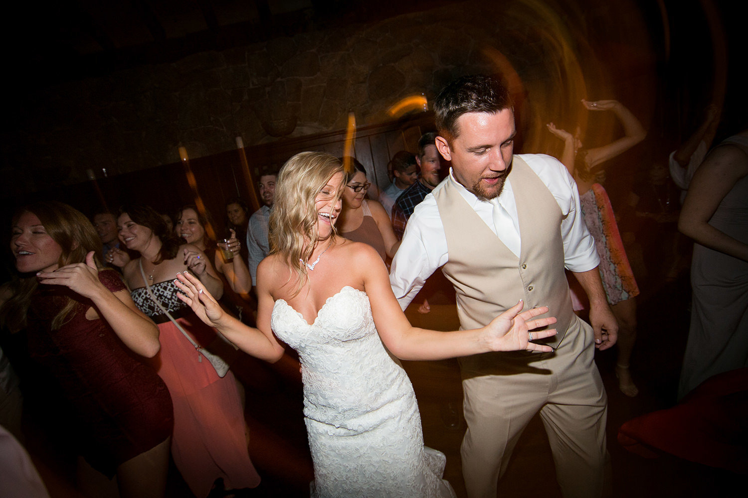 bride and groom dancing fun