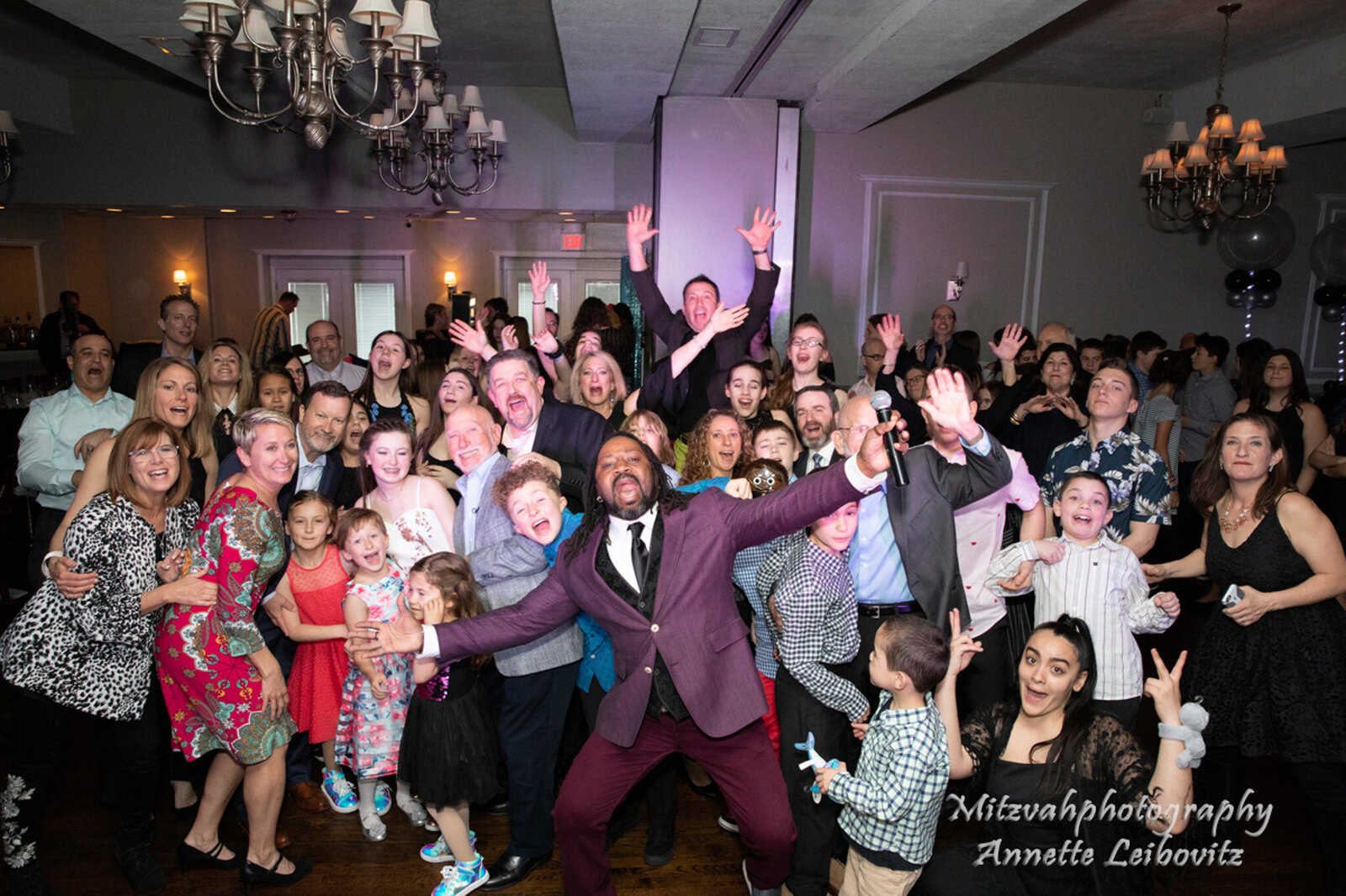 DJ Marz celebrating with kids at event