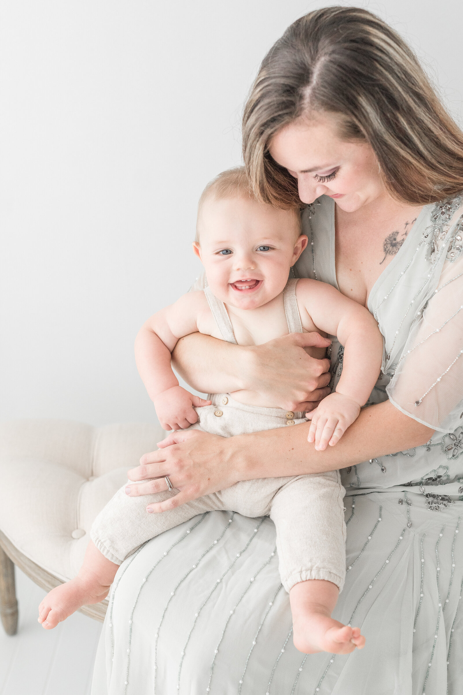 Mom holding 9 month old son