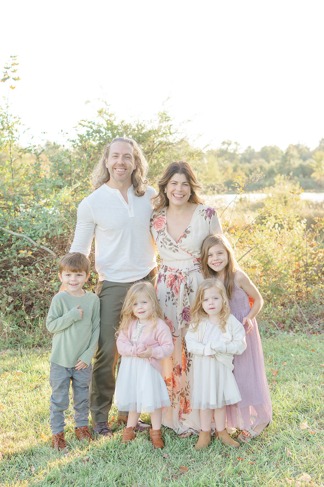 family pose for photo in Chantilly, VA