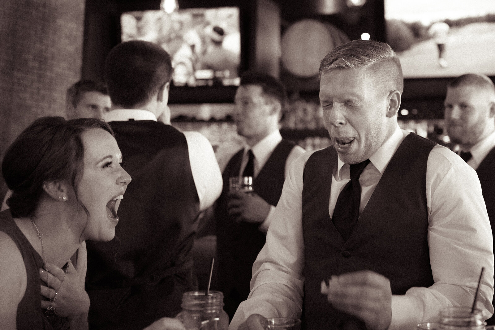 groomsmen makes tequila face
