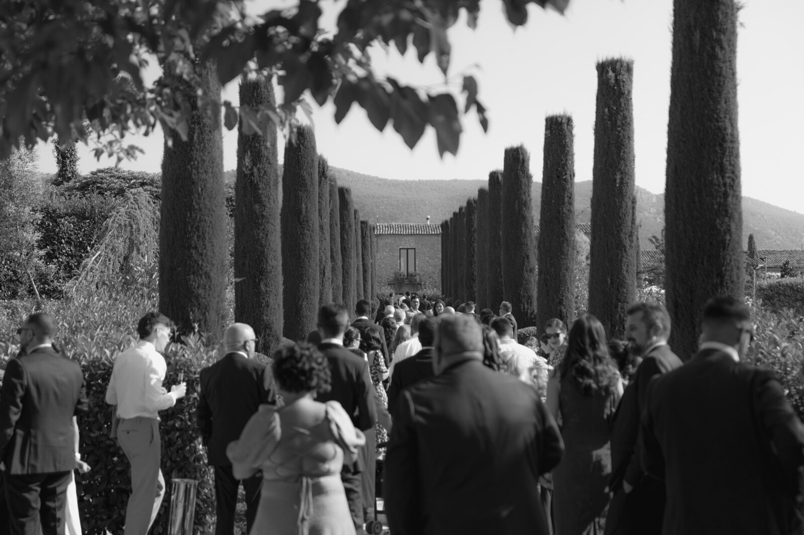 spain wedding venue full of people in blavk and white 