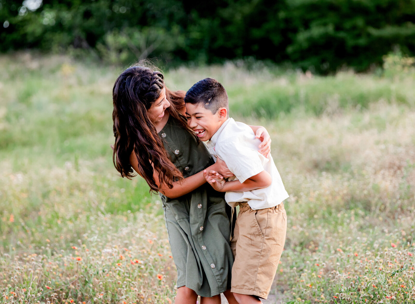 sister tickling brother