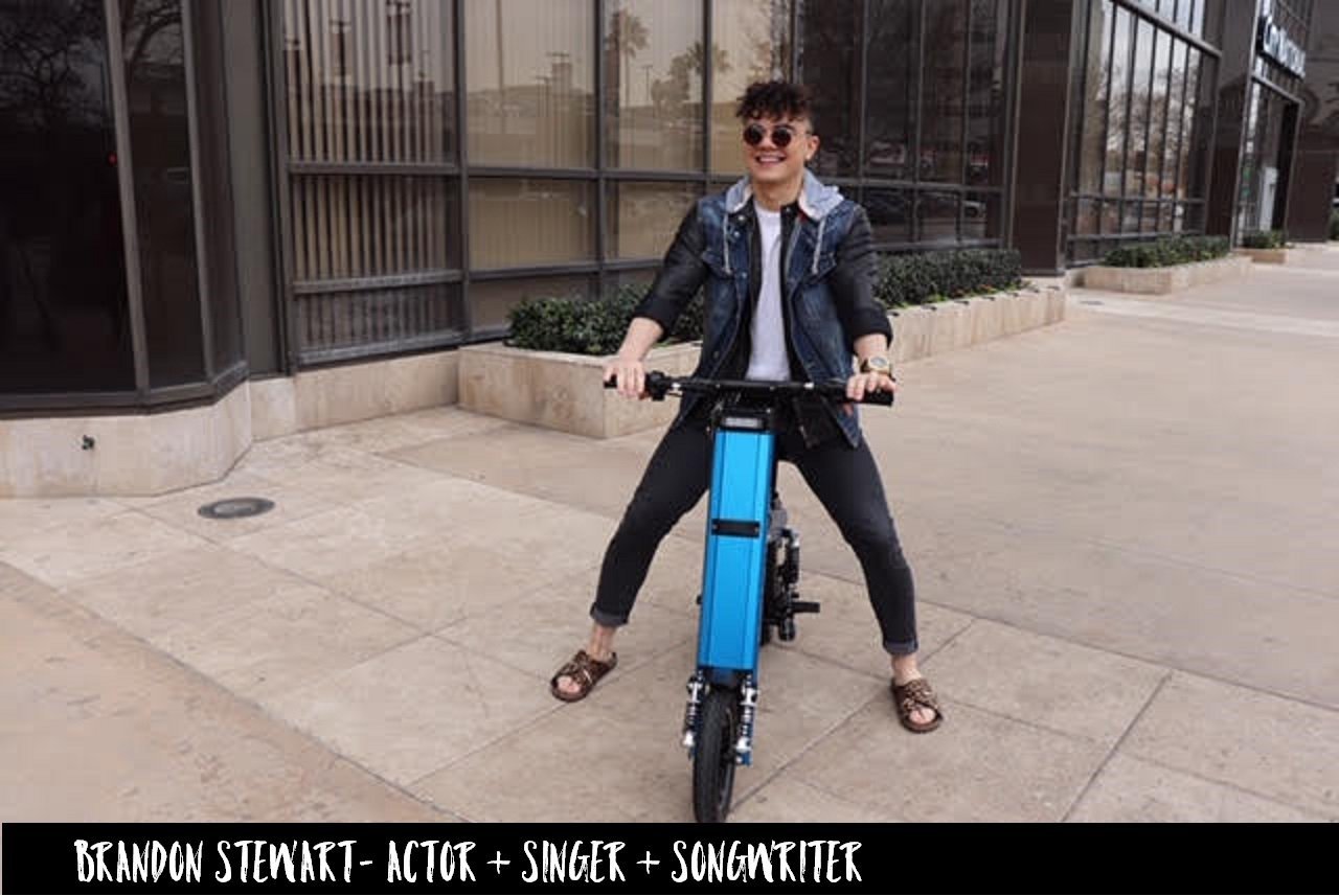 Actor Singer & Songwriter Brandon Stewart cruising around the streets of LA on Blue Go-Bike M2