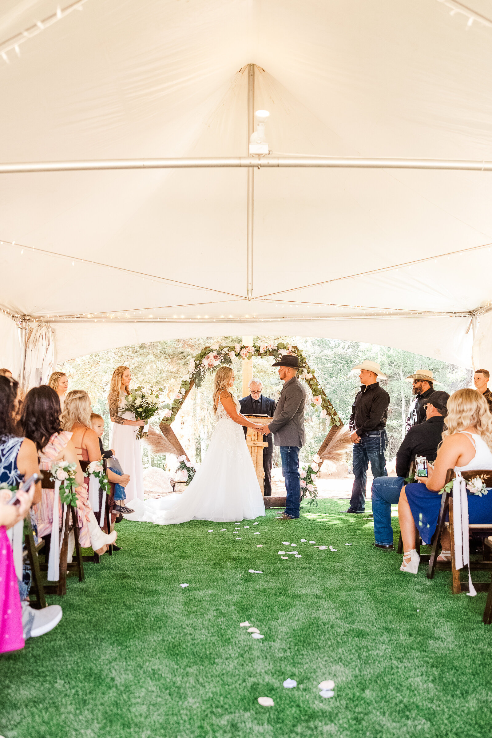 Bride and groom say I Do as they walk back down the isle
