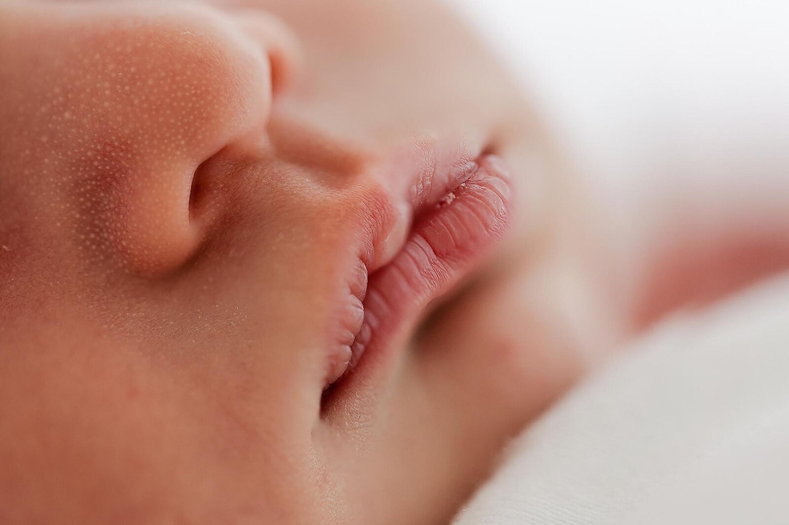 close up of newborn baby mouth and nose