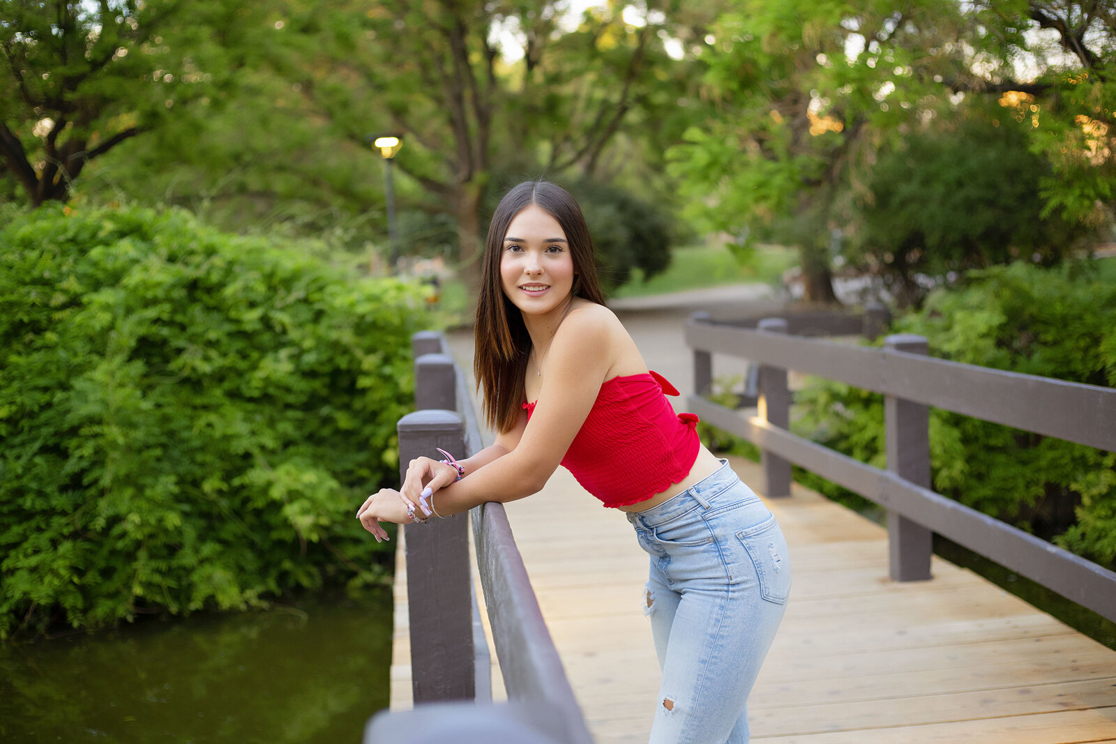 Senior-girl-session-on-a-bridge-in-jeans