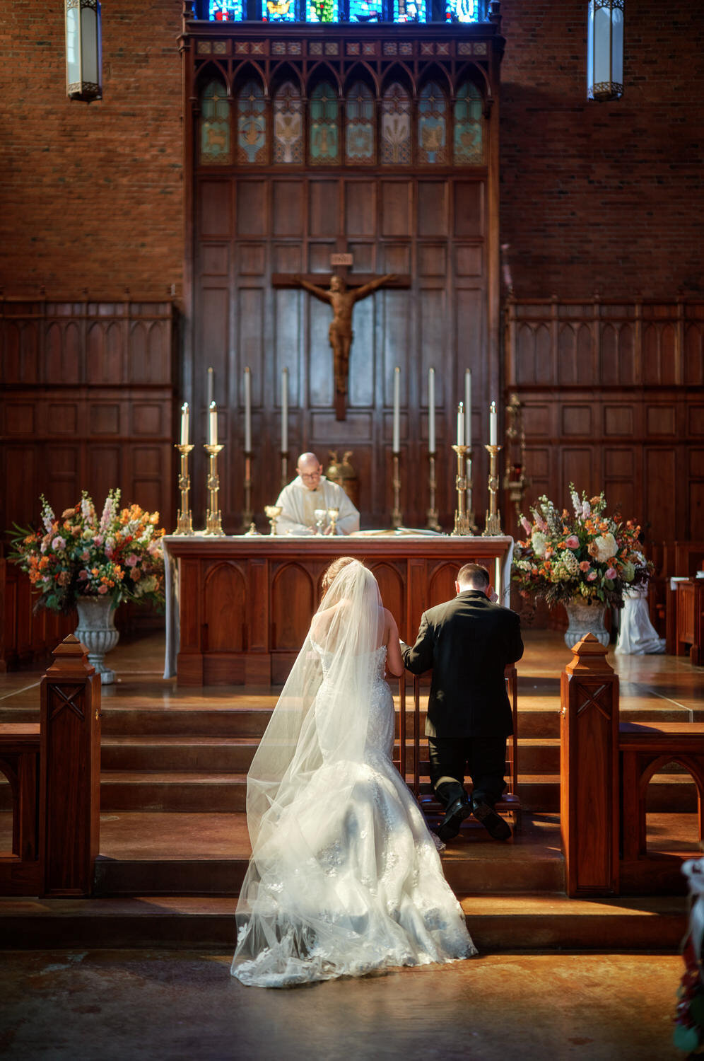 Bride and Groom at the altar at Blessed Sacrament Church.