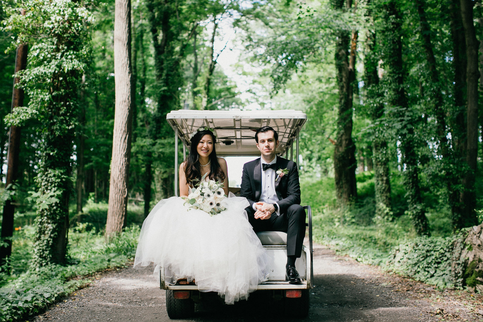 Bride and groom shared a golf cart ride to all the locations on the property of this wedding venue.