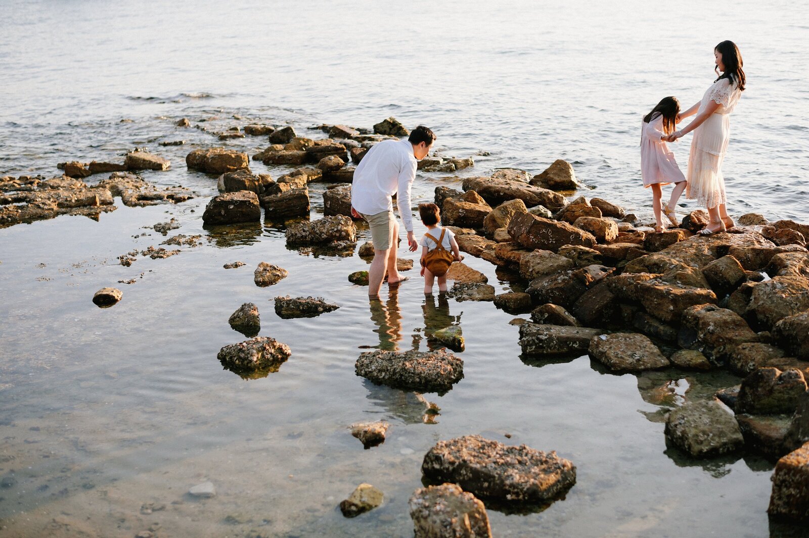 Exploring the shoreline together during a relaxed family photoshoot in Sydney by Tealily