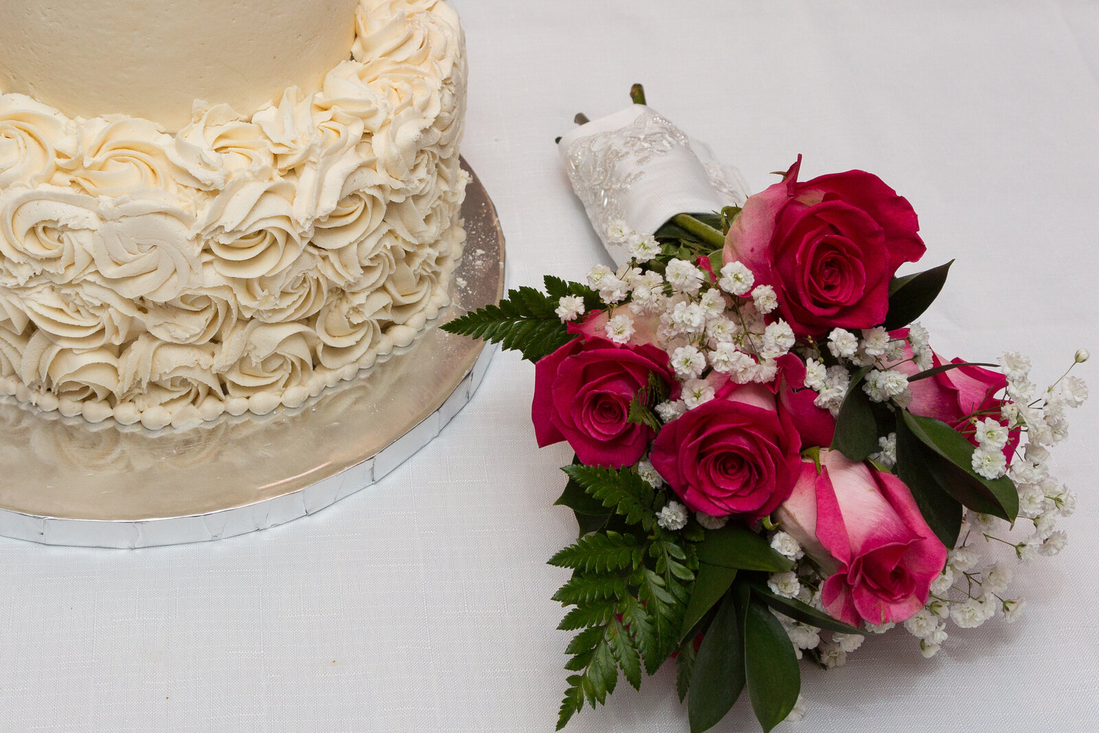 Wedding Cake and Bride's Bouquet  from an at home wedding with Ron Schroll Photography in Charlotte, NC